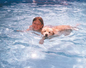 Girl & Dog Swimming